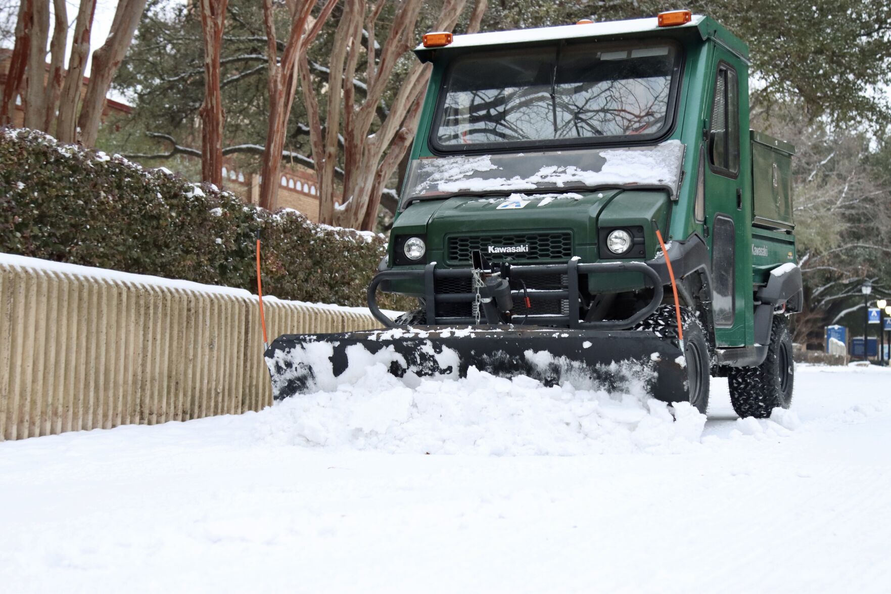Photos: UTA students take advantage of the snowfall blanketing campus